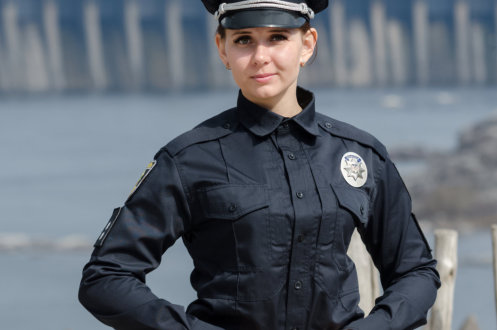 female security smiling